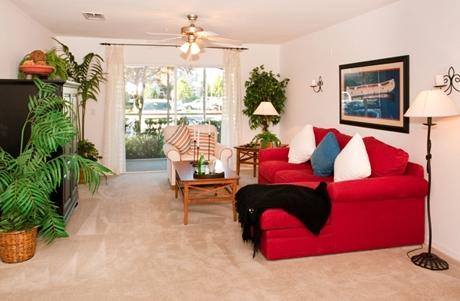 Spacious living room and adjoining balcony Spacious living room and adjoining balcony