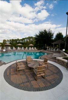 Enjoy outdoor seating next to the pool Enjoy outdoor seating next to the pool