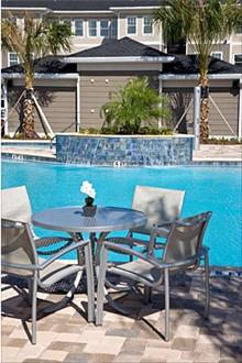 Outdoor poolside tables make for great picnic areas Outdoor poolside tables make for great picnic areas