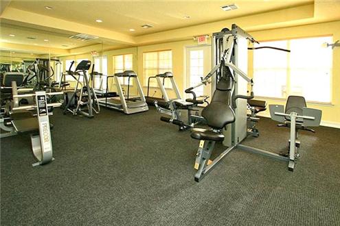 Fitness Center with cardio and weight machines Fitness Center with cardio and weight machines