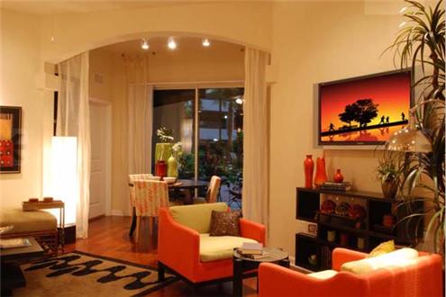Spacious living room with sunroom