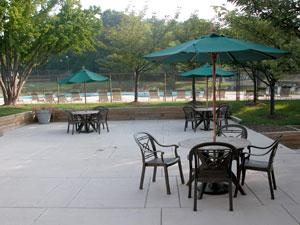 Outdoor picnic area next to the pool Outdoor picnic area next to the pool
