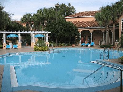 Sparkling pool with chairs and tables Sparkling pool with chairs and tables