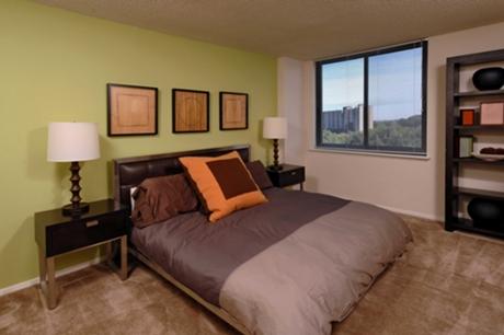 Bedroom with beautiful wooded view from window
