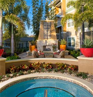 Hot tub and poolside firepit Hot tub and poolside firepit
