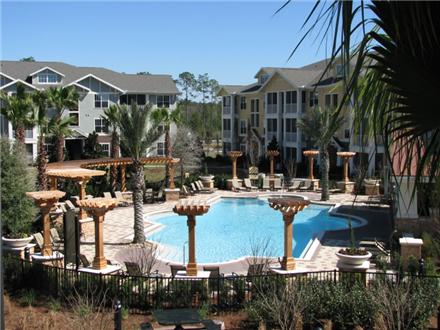 Resort style pool with expansive sundeck Resort style pool with expansive sundeck
