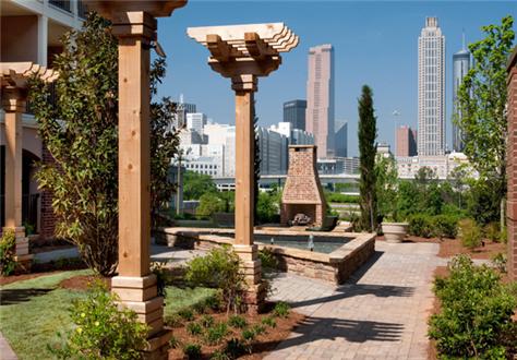 Expansive, grassy areas amid lavish landscapig Expansive, grassy areas amid lavish landscapig