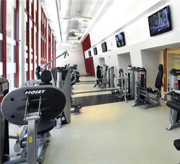Fitness center includes flat screen TVs