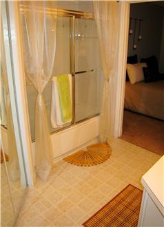 Spacious bathroom with shower doors Spacious bathroom with shower doors