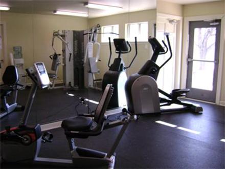 Fitness center equipped with cardio and strength training machines Fitness center equipped with cardio and strength training machines