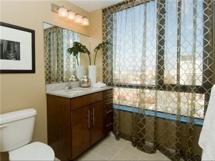 Expansive bathroom with granite vanity Expansive bathroom with granite vanity