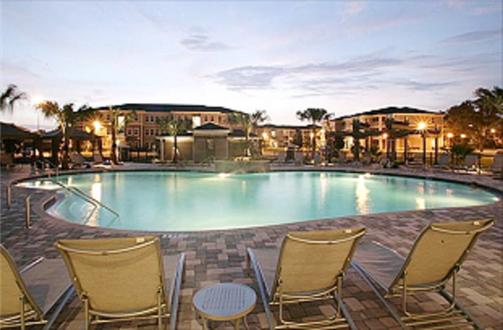 Plenty of outdoor seating around this spectacular pool Plenty of outdoor seating around this spectacular pool