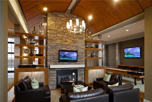 Expansive 24-hour resident club room with e-Cafe and shuffleboard Expansive 24-hour resident club room with e-Cafe and shuffleboard