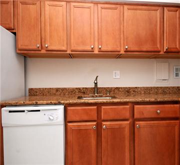 Beautiful wooden cabinets and lots of counter space Beautiful wooden cabinets and lots of counter space
