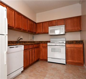 Open kitchen with abundant cabinet space Open kitchen with abundant cabinet space