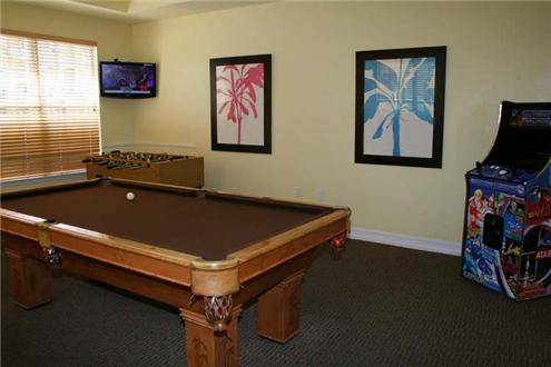 Clubhouse game room with billiards table Clubhouse game room with billiards table