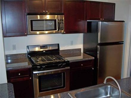 Beautiful kitchen with stainless steel appliances Beautiful kitchen with stainless steel appliances