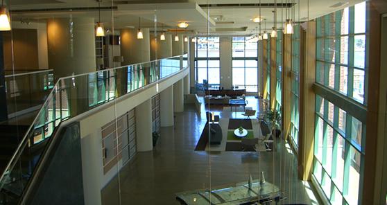 Chic metropolitan decor throughout two story lobby Chic metropolitan decor throughout two story lobby