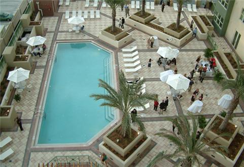 Resort‐style sundeck, pool and spa at the river’s edge Resort‐style sundeck, pool and spa at the river’s edge