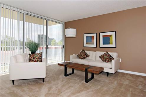 Living room rich with floor to ceiling windows Living room rich with floor to ceiling windows