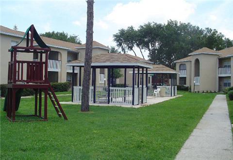 Playground and shaded seating area Playground and shaded seating area