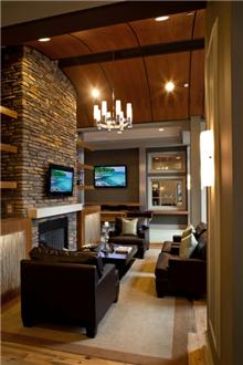 Warm fireplace and comfortable seating in the residents' lounge Warm fireplace and comfortable seating in the residents' lounge