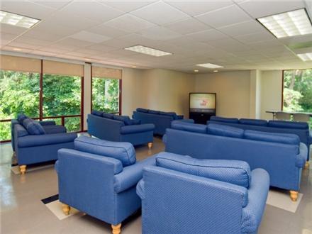 Residents' lounge with comfortable seating Residents' lounge with comfortable seating