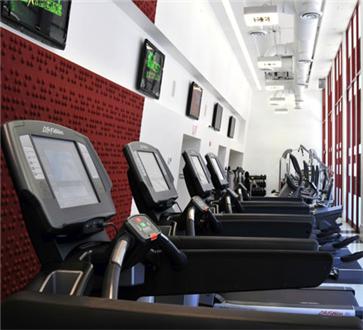 Fitness center furnished with cardio machines