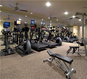 Fitness center with cardio and weight training equipment