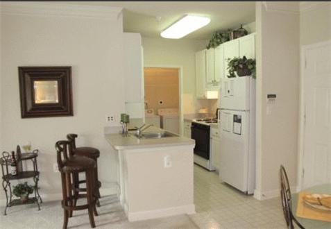 Spacious kitchen and dining area Spacious kitchen and dining area