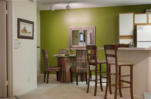 Kitchen and dining area with beautiful accent wall Kitchen and dining area with beautiful accent wall