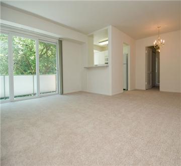 Spacious living area with adjoining balcony Spacious living area with adjoining balcony