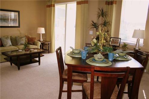 Spacious living room with dining area Spacious living room with dining area