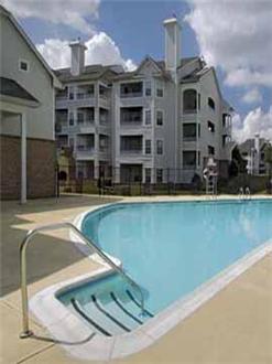Large pool and residence exterior Large pool and residence exterior