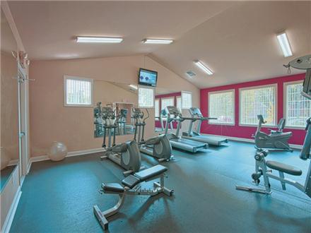 Fitness center features cardio and weight equipment Fitness center features cardio and weight equipment
