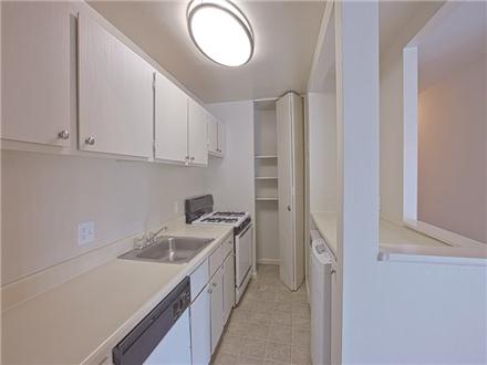The upgraded Foyer kitchen features pantry and washer and dryer units The upgraded Foyer kitchen features pantry and washer and dryer units