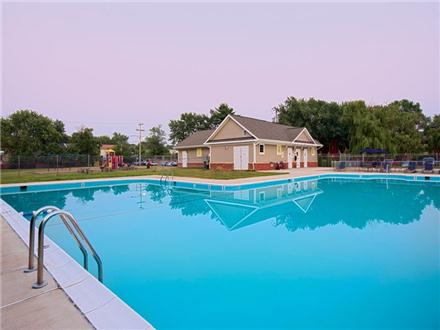 Take a swim in our large outdoor pool Take a swim in our large outdoor pool